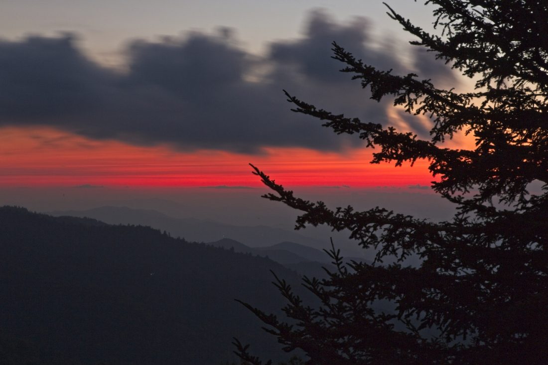 Warm sunset light over silhouetted Blue Ridge ridgelines — Waterrock Knob, Blue Ridge Parkway